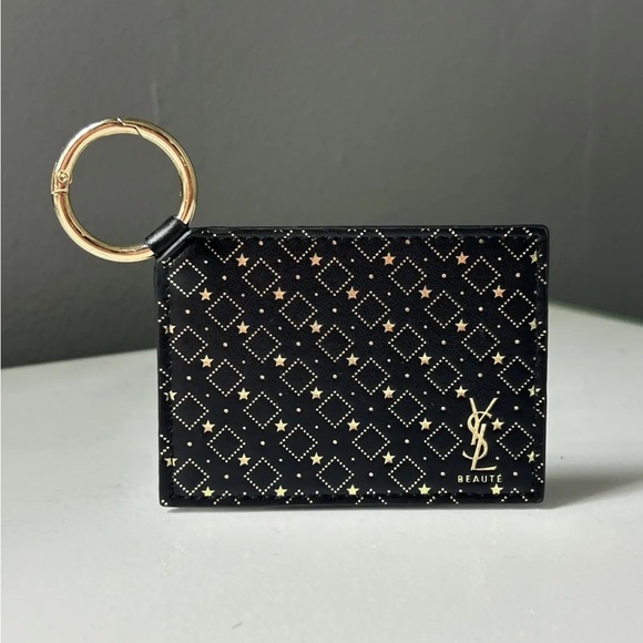Yves Saint Laurent Black and Gold Star Patterned Key Holder - Picture 1 of 5